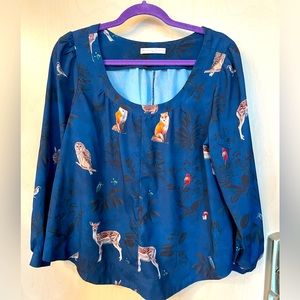 Navy Woodland creature boho shirt with bell like, full sleeves.